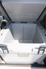 Open K2 cooler in an RV rental, showing a clean interior ready for beverages and food.
