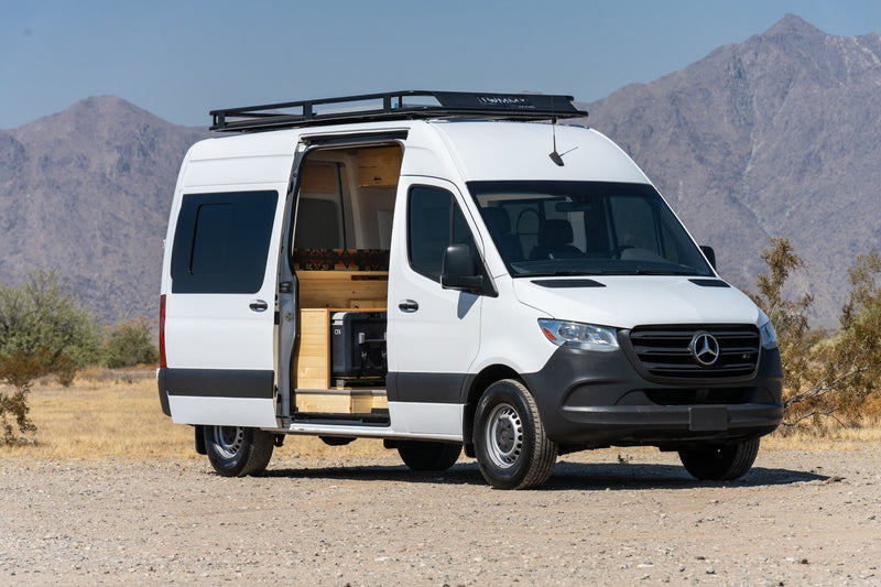  parked on gravel with side door open — photo 6