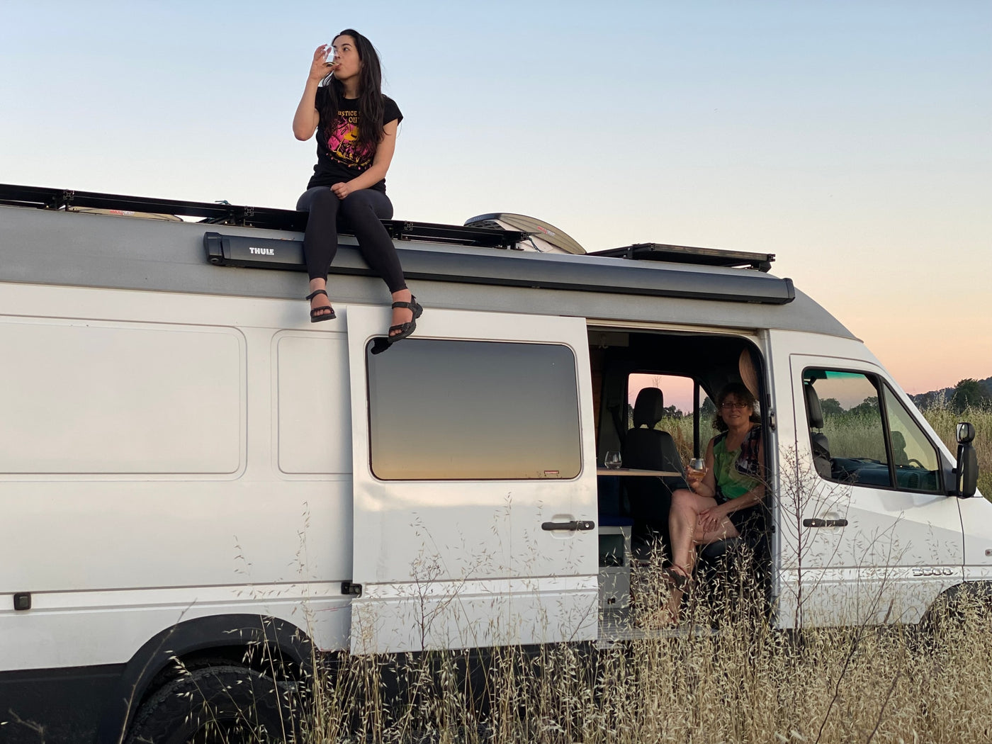  and ample storage.||Cozy RV rental interior featuring a compact camper kitchen — photo 39