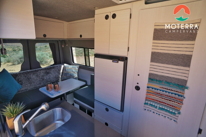  and open views to the desert landscape.|RV rental interior: A bright