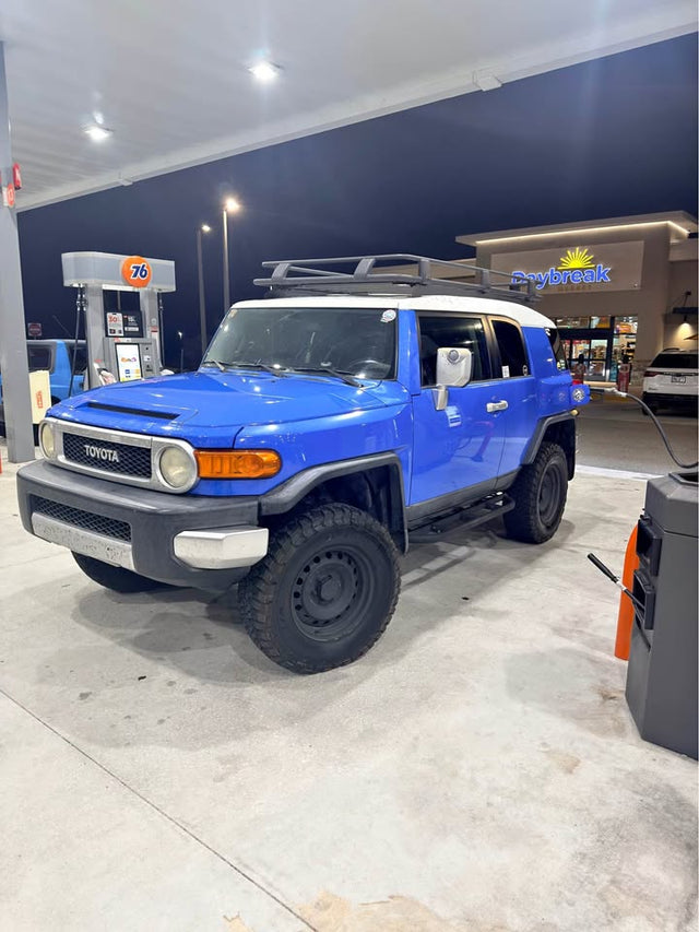 Blue Toyota FJ Cruiser with roof rack. 2007 Toyota FJ Cruiser 4x4 - Clean Title - Well Maintained
P in Miami, FL (photo 1)