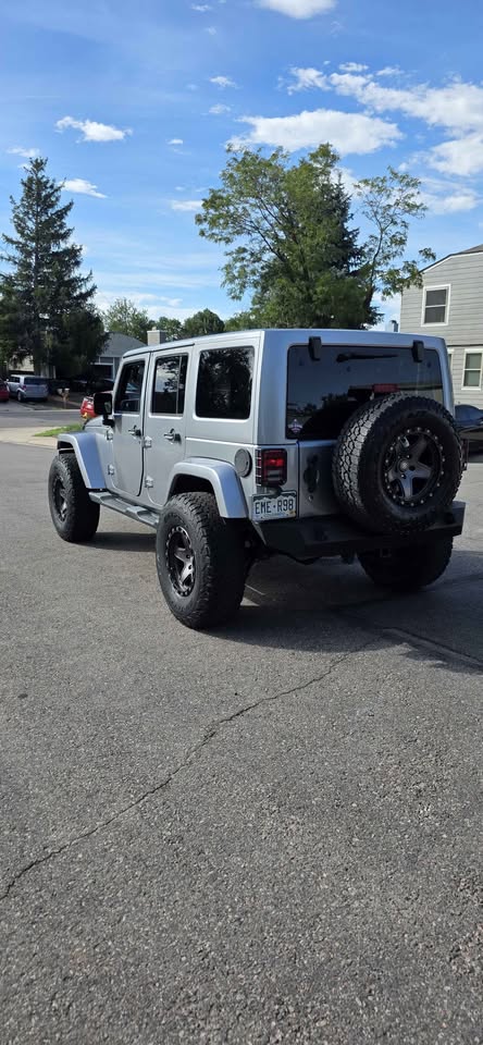 2013 Jeep Wrangler Unlimited · Sahara Sport Utility 4D in Denver, CO (photo 7) — photo 7