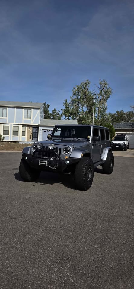 2013 Jeep Wrangler Unlimited · Sahara Sport Utility 4D in Denver, CO (photo 1) — photo 1