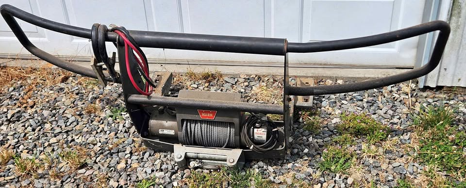 WARN x8000i winch on 1999 chevrolet brush guard. Used very little in Edgewood, WA (photo 1)