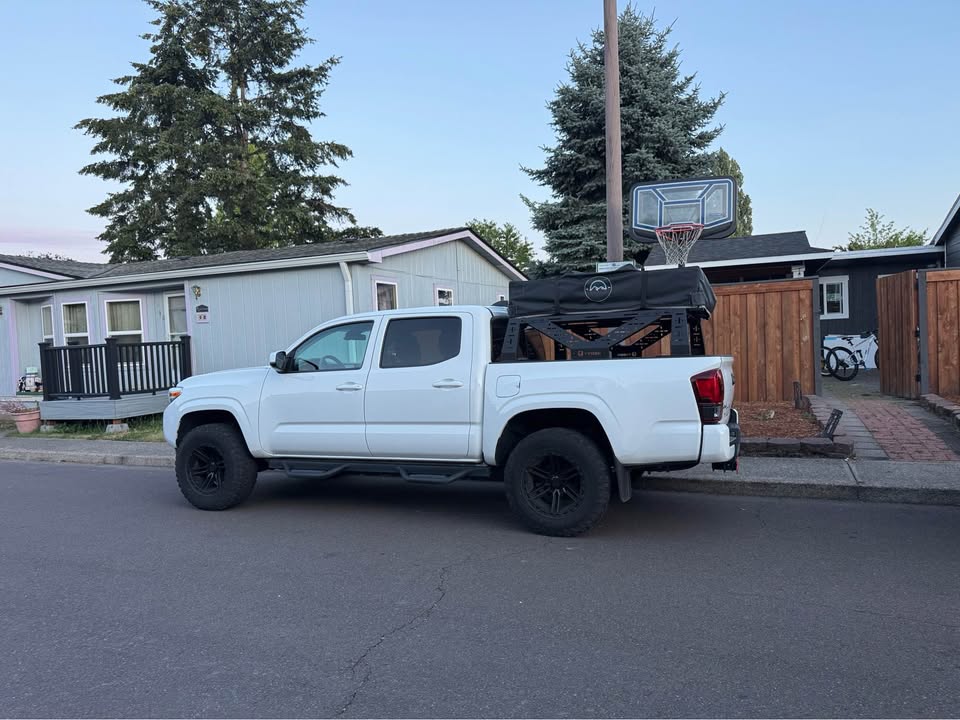 Overland Vehicle Systems HD Nomadic Extended Soft Shell Rooftop Tent with Tyger Auto Plate Style Bed Rack in Portland, OR (photo 6)