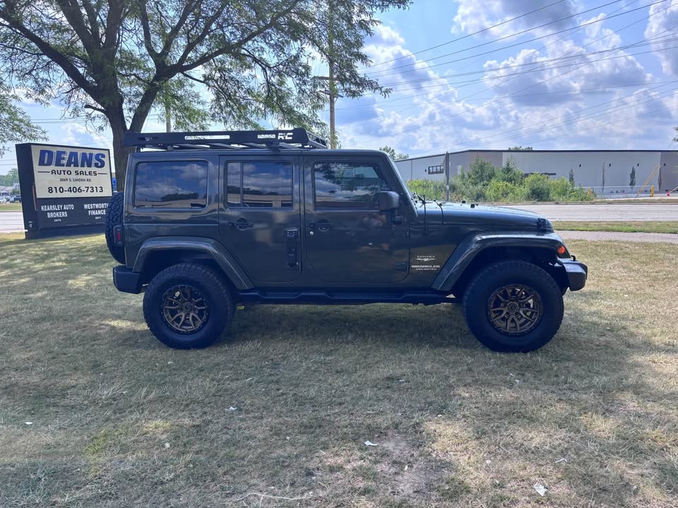 2015 Jeep Wrangler · Unlimited Sahara Sport Utility 4D in Flint, MI (photo 2) — photo 2