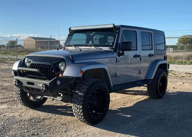 2013 Jeep Wrangler Unlimited · Sahara Sport Utility 4D — photo 3