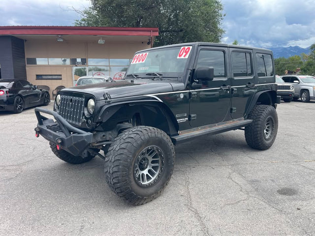 2011 Jeep Wrangler Unlimited · Sport SUV 4D — photo 2