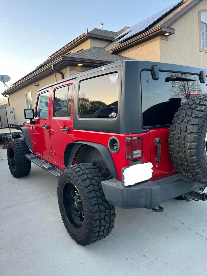 2014 Jeep Wrangler Unlimited · Sport in West Jordan, UT (photo 3) — photo 3