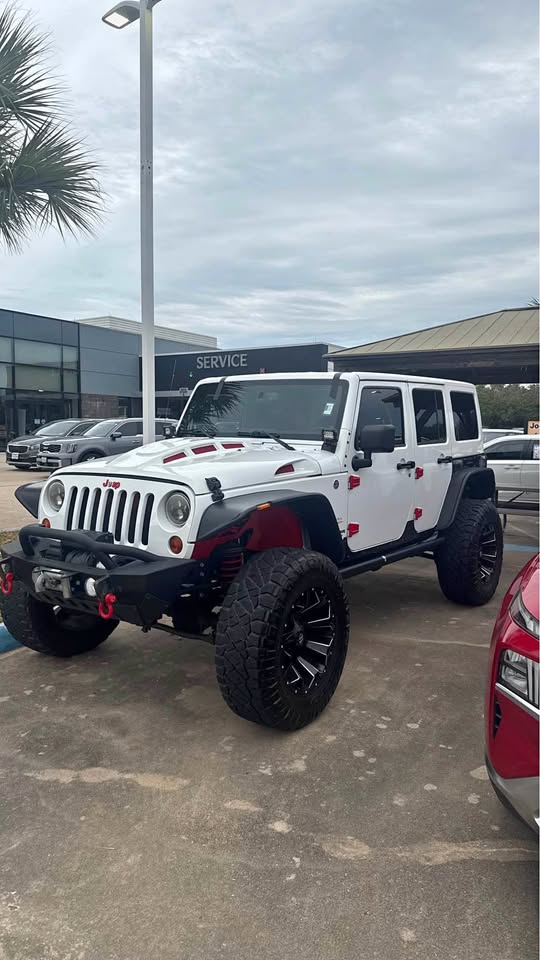 2013 Jeep Wrangler · Sahara in Jersey Village, TX (photo 1)