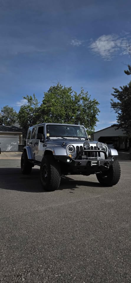 2013 Jeep Wrangler Unlimited · Sahara Sport Utility 4D — photo 3