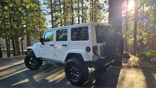 2011 Jeep Wrangler · Unlimited Sport SUV 4D — photo 2