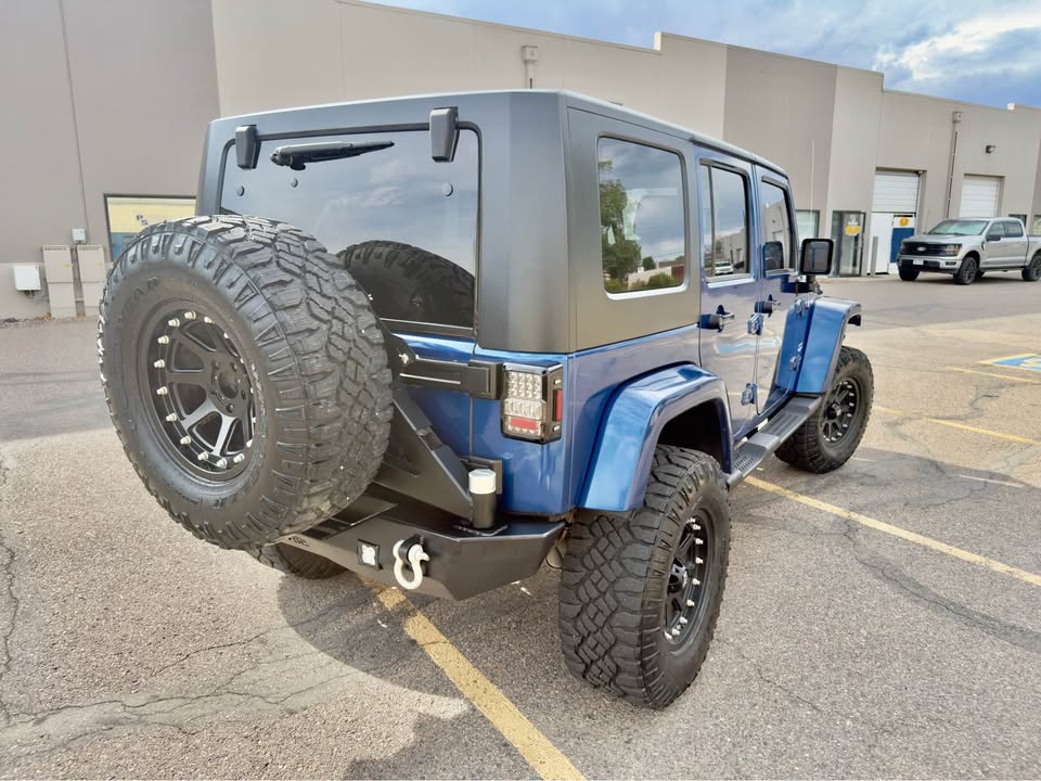 2010 Jeep Wrangler Unlimited · Sahara Sport Utility 4D in Arvada, CO (photo 4) — photo 4