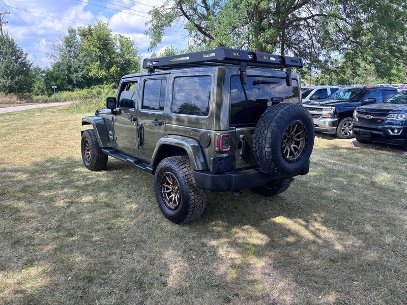 2015 Jeep Wrangler · Unlimited Sahara Sport Utility 4D in Flint, MI (photo 4) — photo 4