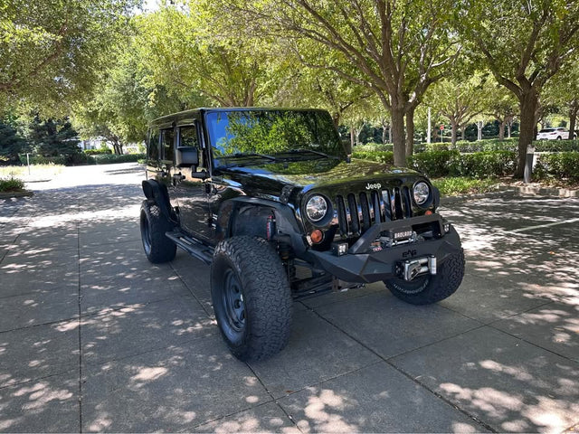 2011 Jeep Wrangler · Sahara Sport Utility 4D — photo 3