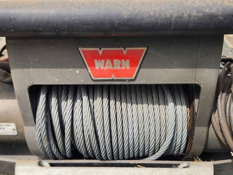 WARN x8000i winch on 1999 chevrolet brush guard. Used very little in Edgewood, WA (photo 2)