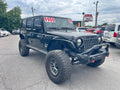 2011 Jeep Wrangler Unlimited · Sport SUV 4D
