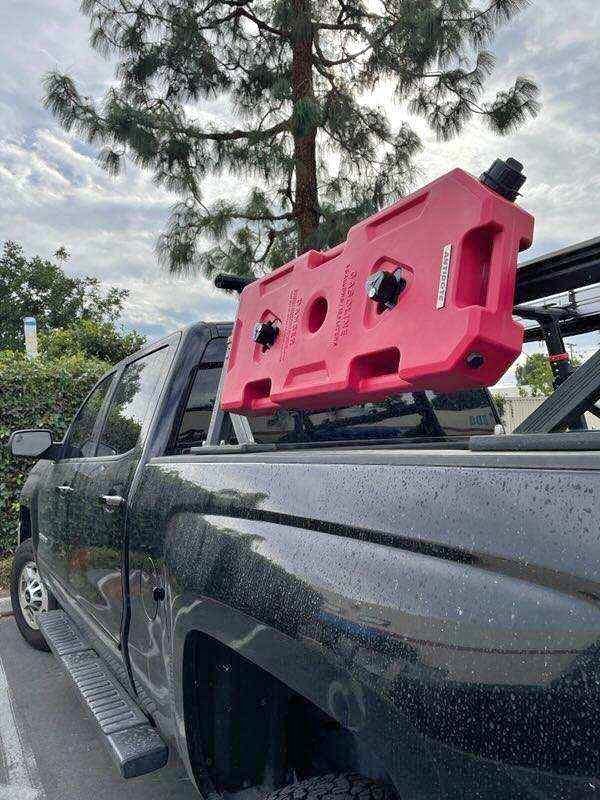 5 gallon gas cans with mounts and locks in Placentia, CA (photo 1) — photo 1