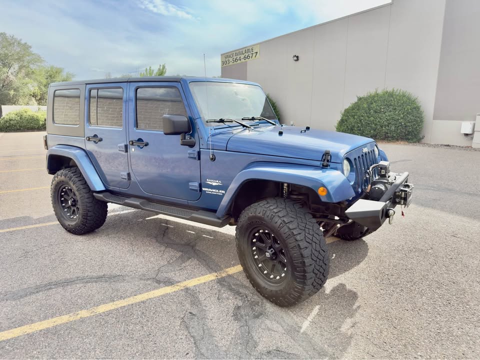 2010 Jeep Wrangler Unlimited · Sahara Sport Utility 4D in Arvada, CO (photo 3) — photo 3