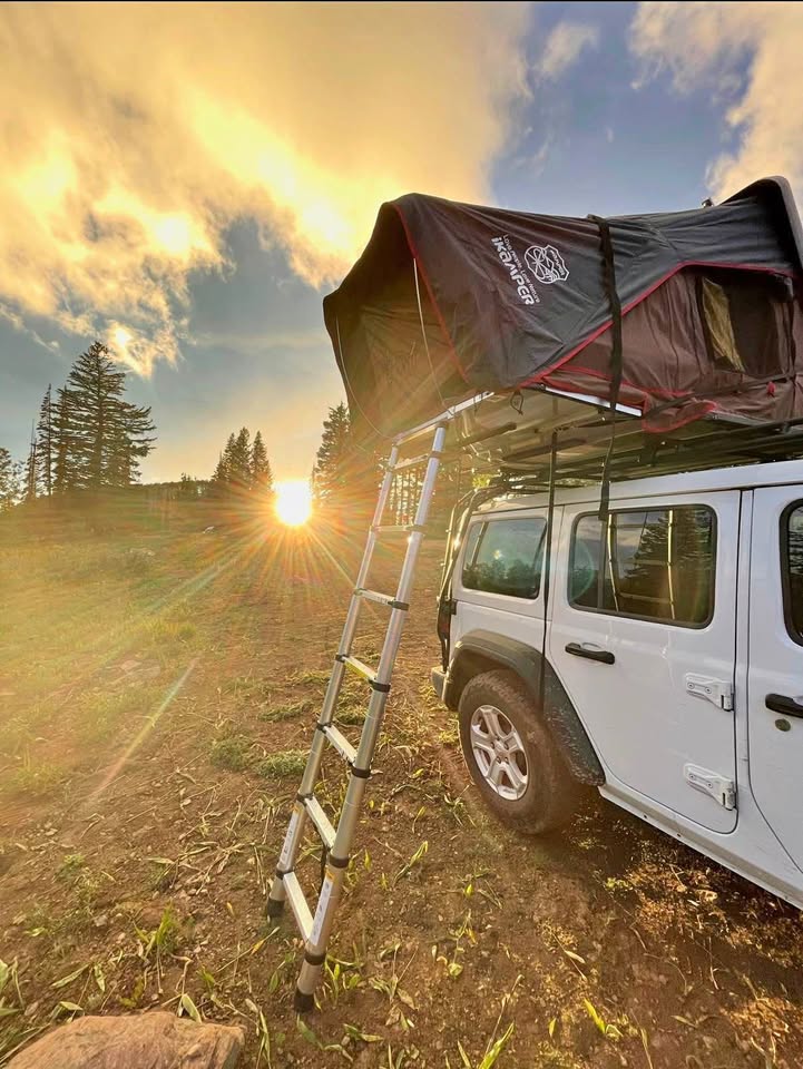 Hardshell 2-person iKamper Rooftop Tent + free accessories (165 lbs, quick setup) in Edgewater, CO (photo 1) — photo 1