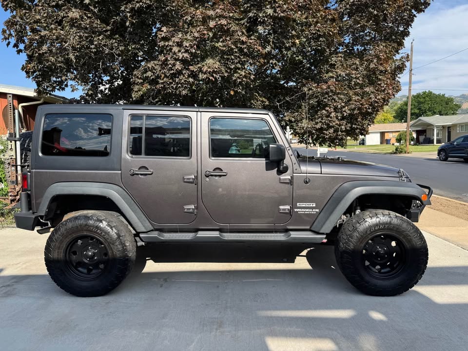2014 Jeep Wrangler Unlimited · Sport (JK) SUV 4D (photo 2) — photo 2