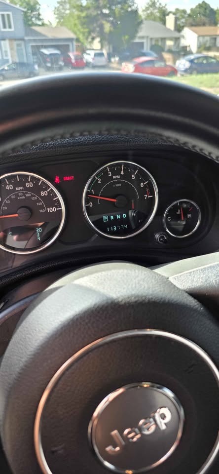 2013 Jeep Wrangler Unlimited · Sahara Sport Utility 4D in Denver, CO (photo 9) — photo 9