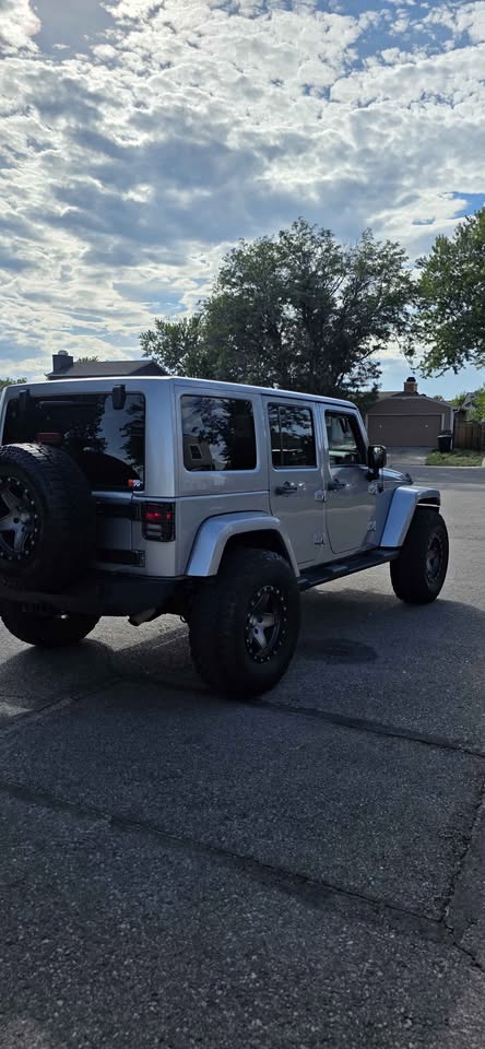 2013 Jeep Wrangler Unlimited · Sahara Sport Utility 4D in Denver, CO (photo 5) — photo 5