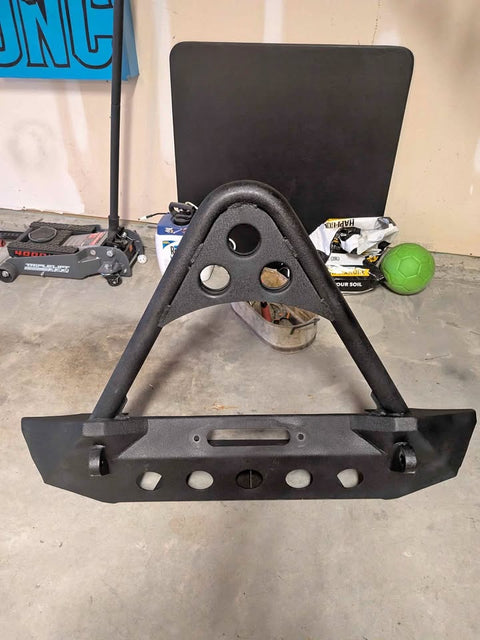 Smittybilt stinger hoop (often part of the Smittybilt SRC or XRC line) with hi-lift jack