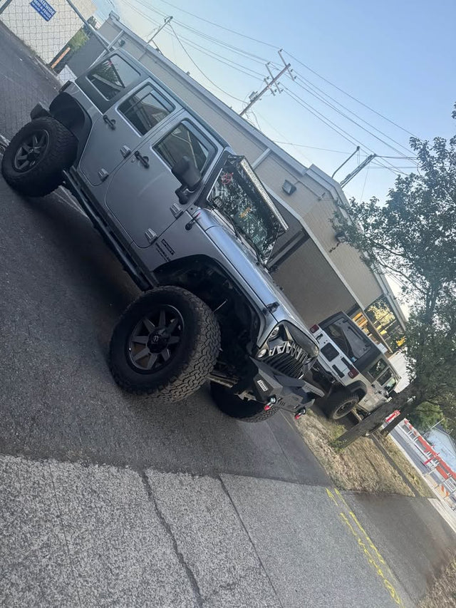 2014 Jeep Wrangler Unlimited · Sport SUV 4D — photo 2