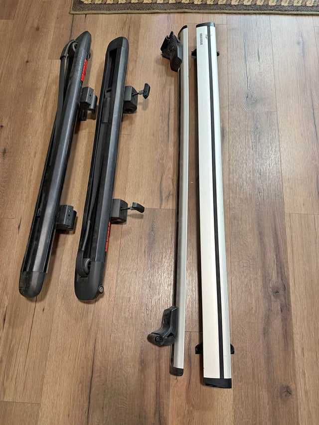 Yakima roof rack with surfboard attachment in San Francisco, CA (photo 1)