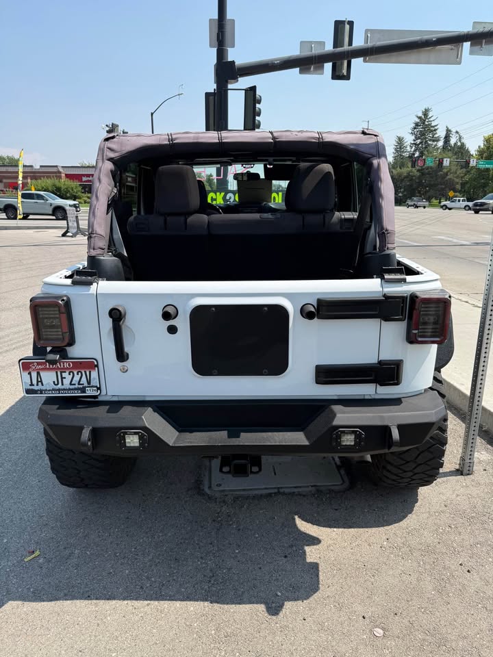 2016 Jeep Wrangler Unlimited · Sport (JK) SUV 4D (photo 4) — photo 4