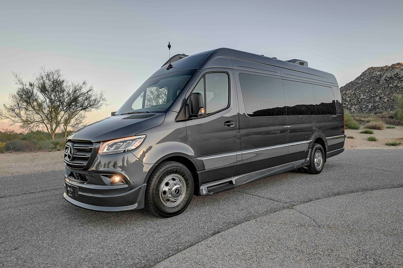  and smart storage solutions for your journey.|Modern RV rental interior with a wall-mounted TV showing a golfer — photo 16