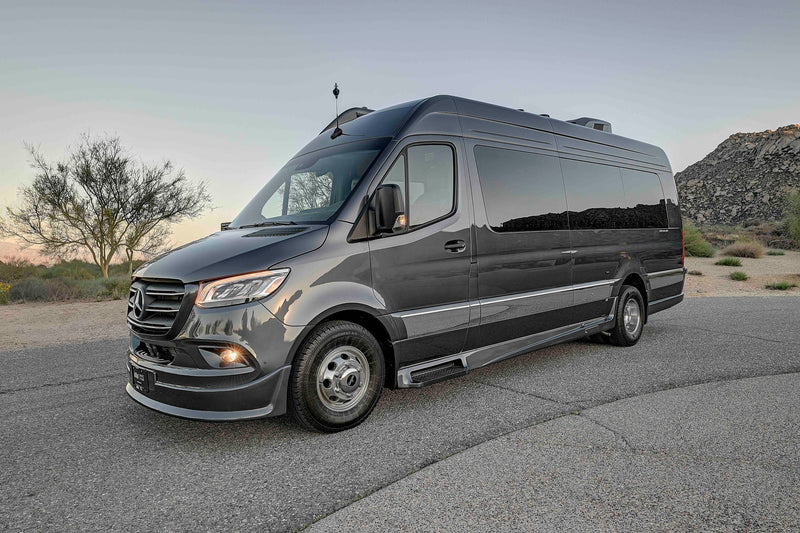  and smart storage solutions for your journey.|Modern RV rental interior with a wall-mounted TV showing a golfer — photo 16