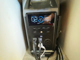 This portable power station, likely in an RV rental, shows 87% battery, 2 hrs to full, 294W input, 55W output.