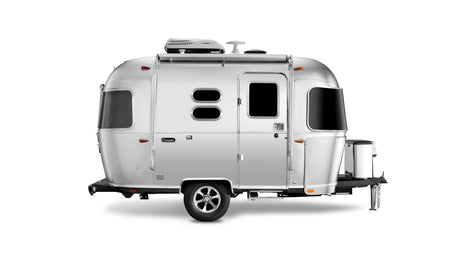 Iconic silver Airstream travel trailer on white, a classic recreational vehicle. Perfect for your next rv rental trip.