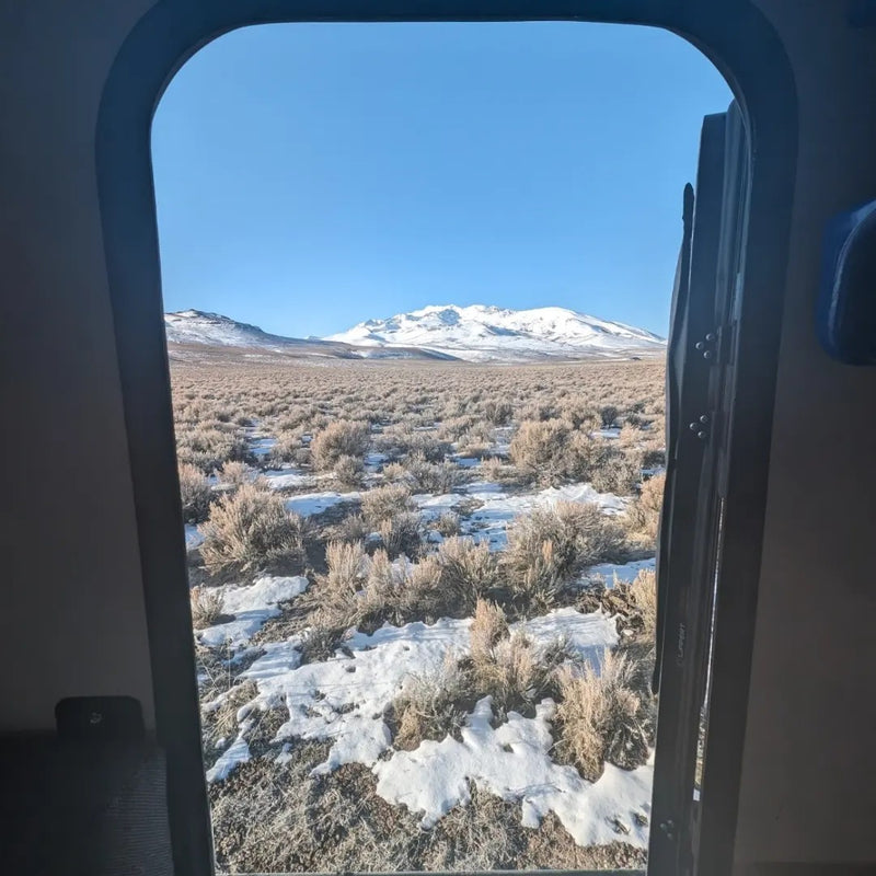 Remote snowy desert and mountain views from an RV rental. Your nature adventure starts here! — photo 14