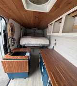  featuring a white camper van