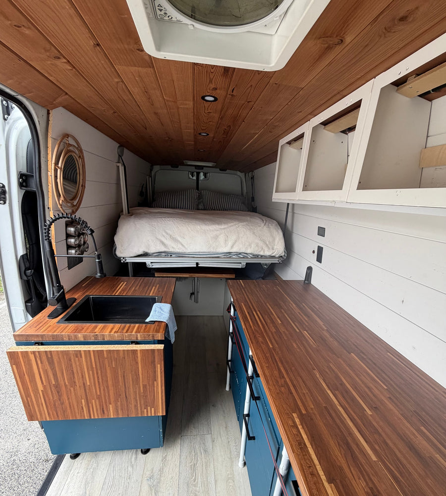  featuring a white camper van