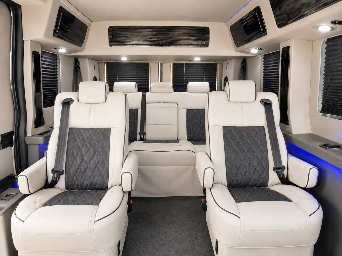  perfect for your next rv rental. View its plush interior through the open side door.|Silver Ford Transit van — photo 4