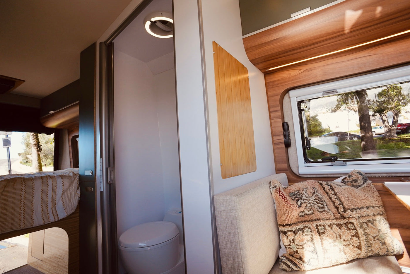  and wood accents. Ready for road trips.|Modern white camper van — photo 7