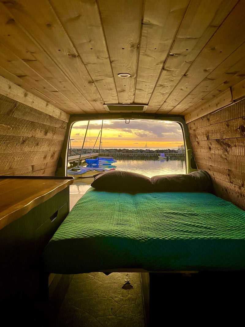 Inside a wood-paneled RV rental — photo 1