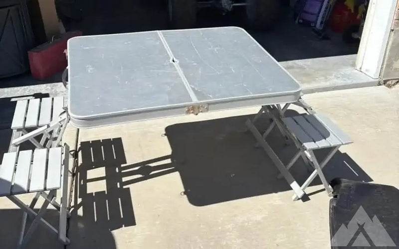 Aluminum folding picnic table — used camp furniture for sale — photo 1