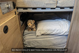 Inside an RV rental: a cozy lower bunk bed with a 60-inch child's mattress, pillow, and a stuffed leopard. Eco-Hot controls visible.