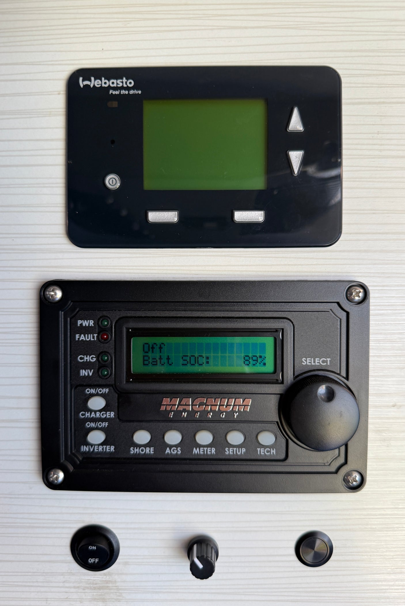 RV rental control panel: Webasto heater, Magnum Energy inverter/charger (89% Batt SOC), and other utility switches.