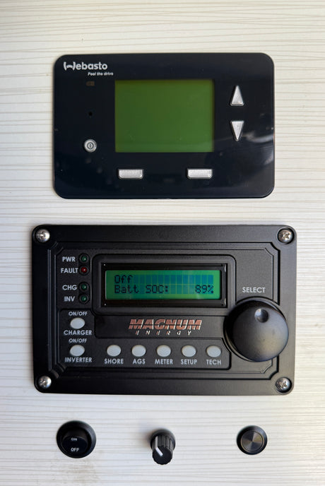RV rental control panel: Webasto heater, Magnum Energy inverter/charger (89% Batt SOC), and other utility switches.