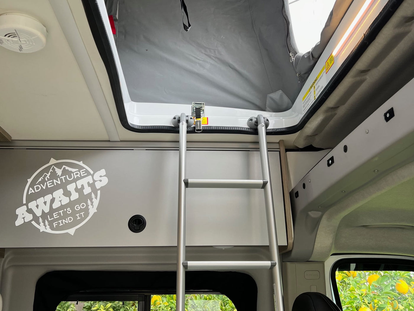  and a fun Disney bag. Ready for a pet-friendly adventure!|Inside this modern camper van RV rental — photo 20
