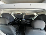RV rental cockpit with dark sun shades on front & side windows. Ready for a comfortable journey!