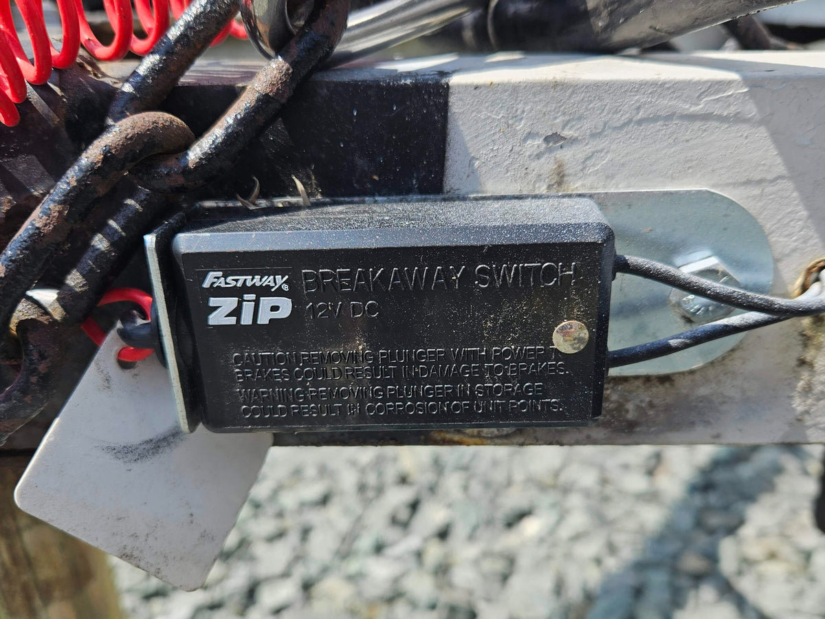 Close-up: Fastway Zip 12V DC trailer breakaway switch, crucial safety for RV rental brakes. — photo 19