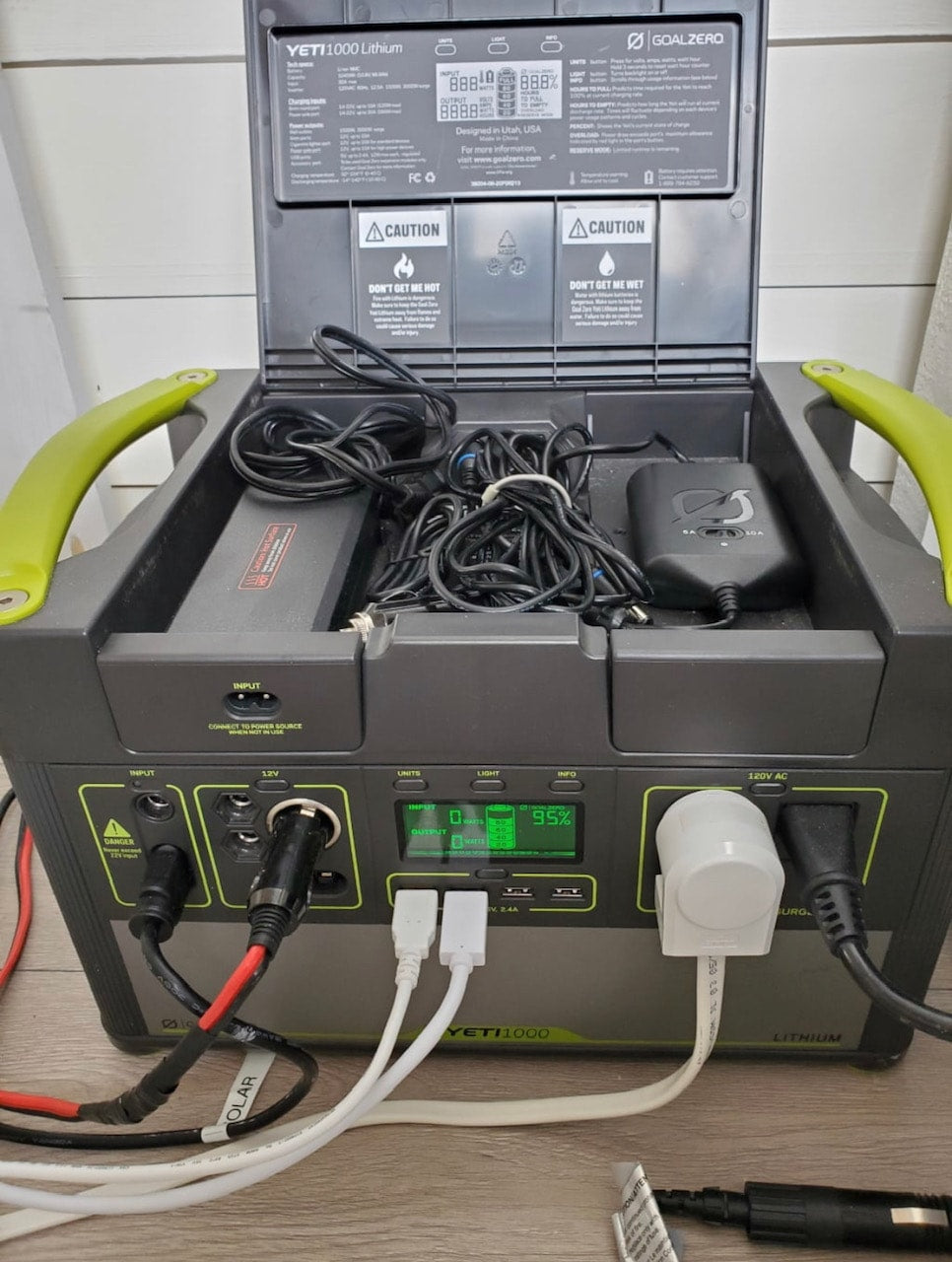 A Goal Zero Yeti 1000 portable power station, ready for your rv rental. Off-grid power for camping & more, with cables connected. — photo 17