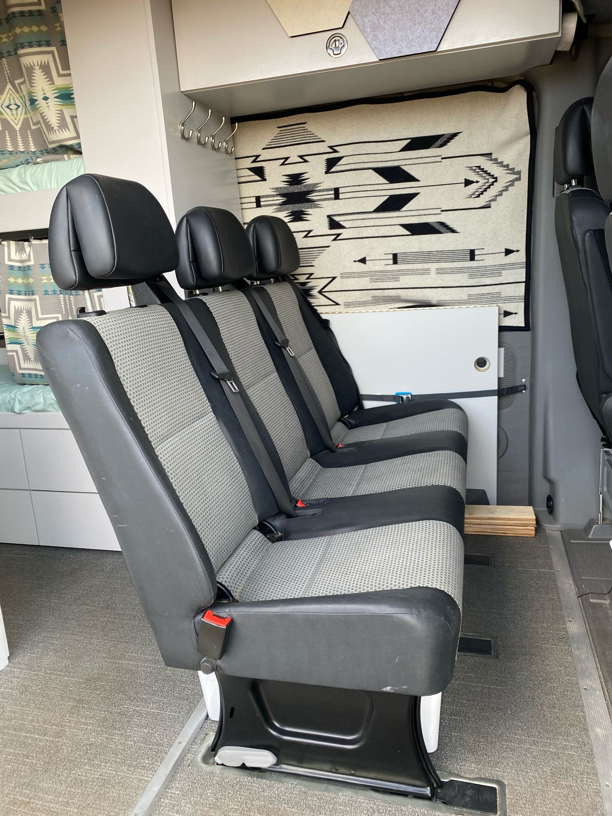  and "Life's a Journey" sign.|Cozy camper van interior — photo 5